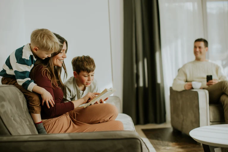 Family sitting on couch